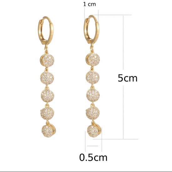 Wiszące kolczyki z cyrkoniami w kolorze różowego złota – elegancki blask.